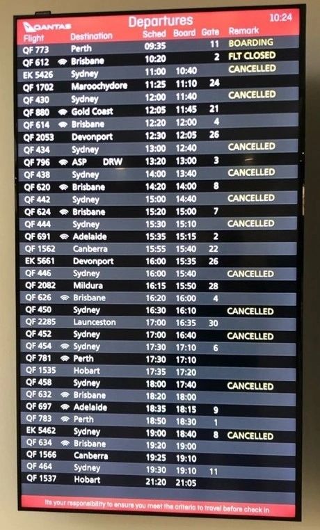 Qantas Departure board the day borders restrictions for NSW were announced 
