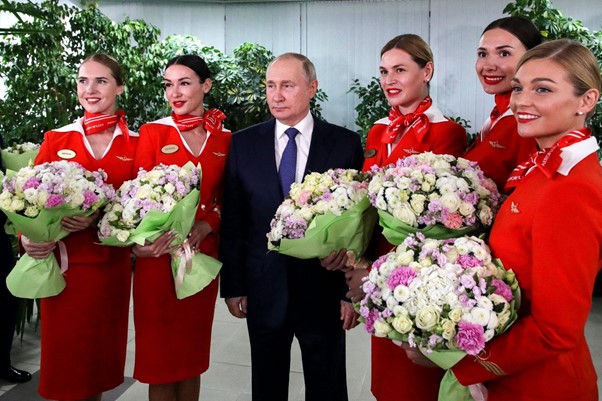 Putin Surrounds Himself With Flight Attendants As War On Ukraine Rages On