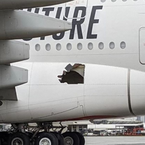 Emirates B777 with Hole in Fusolage